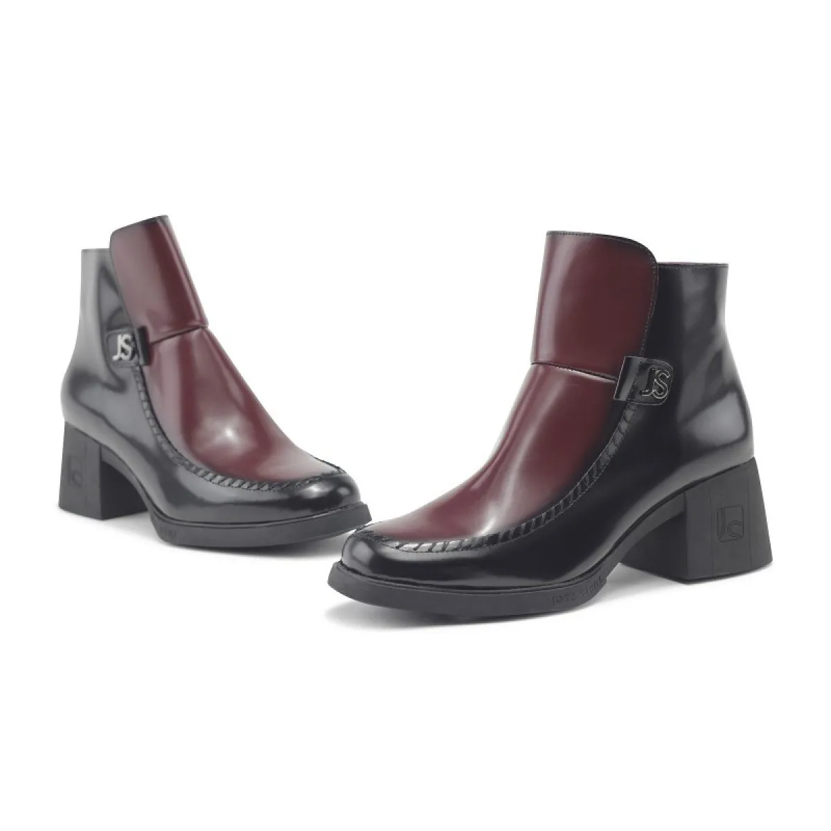 Bottines en cuir à talon et surpiqures - Noir